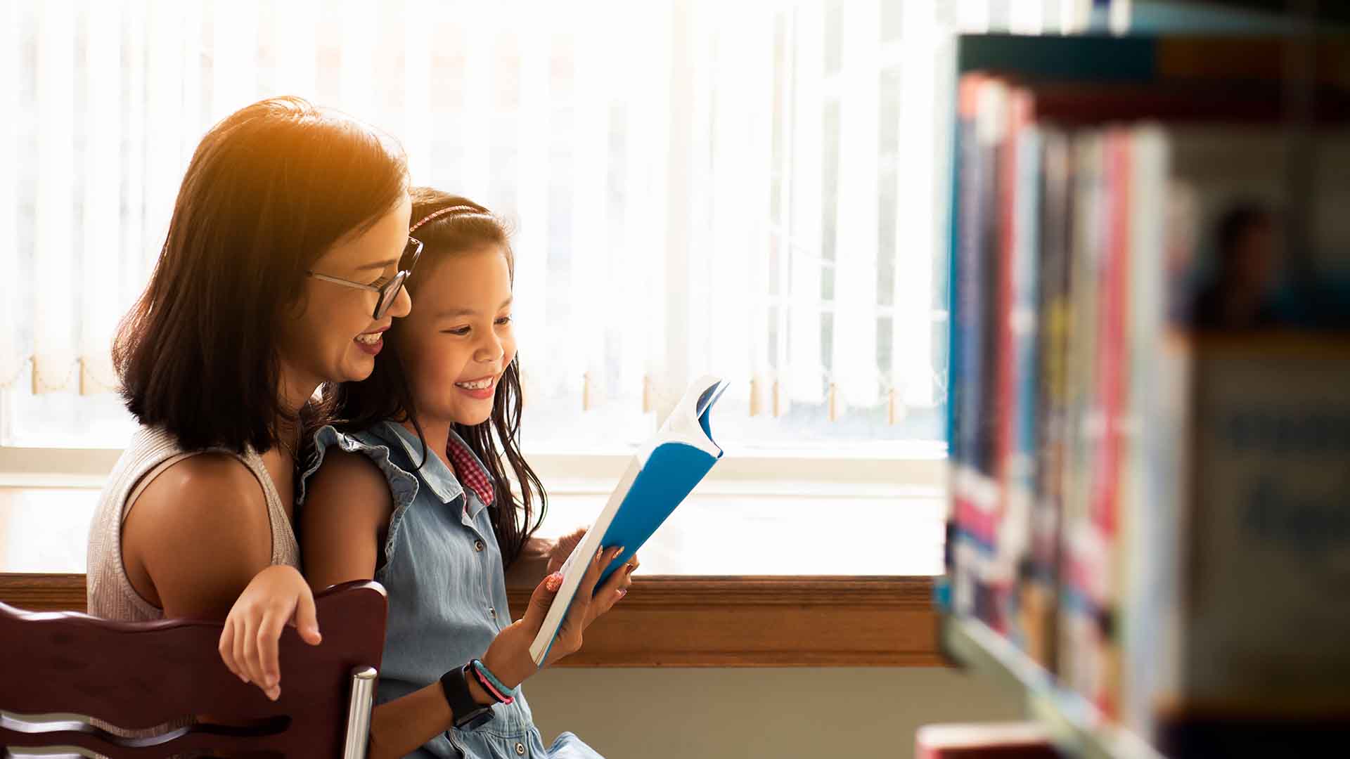 Children discussing in the classroom, image is used for health insurance