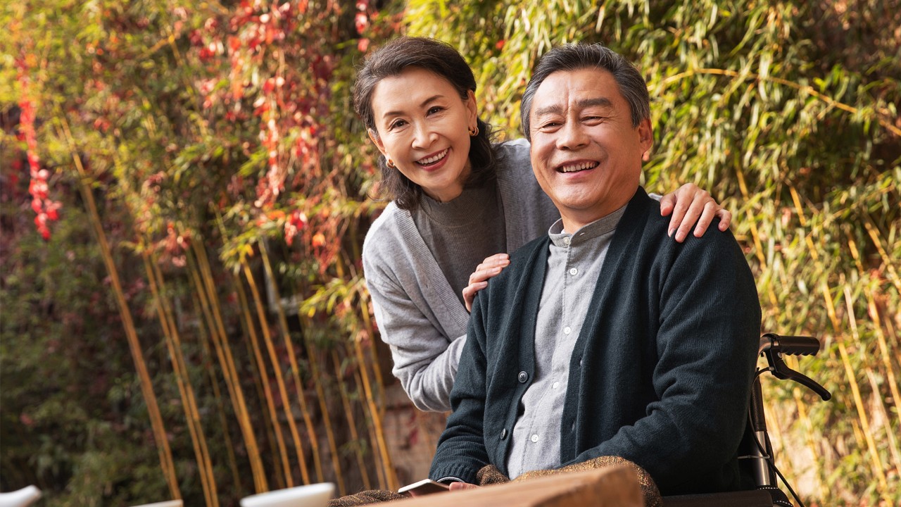 Elderly couple walking in the park;image used for how to stay financially healthy